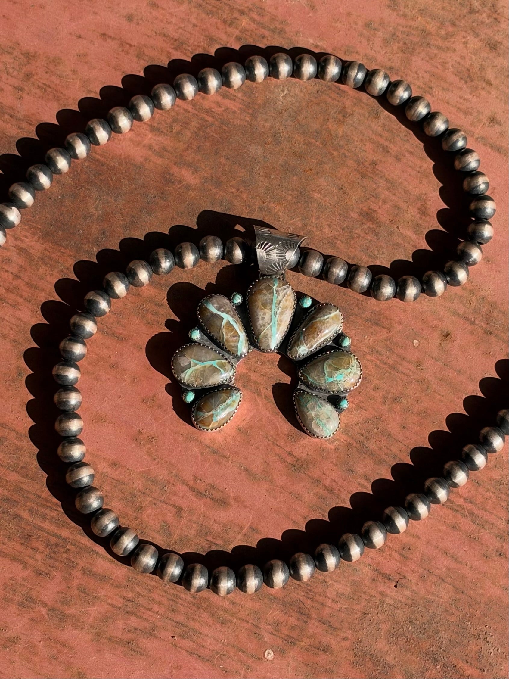Ribbon Naja Pendant