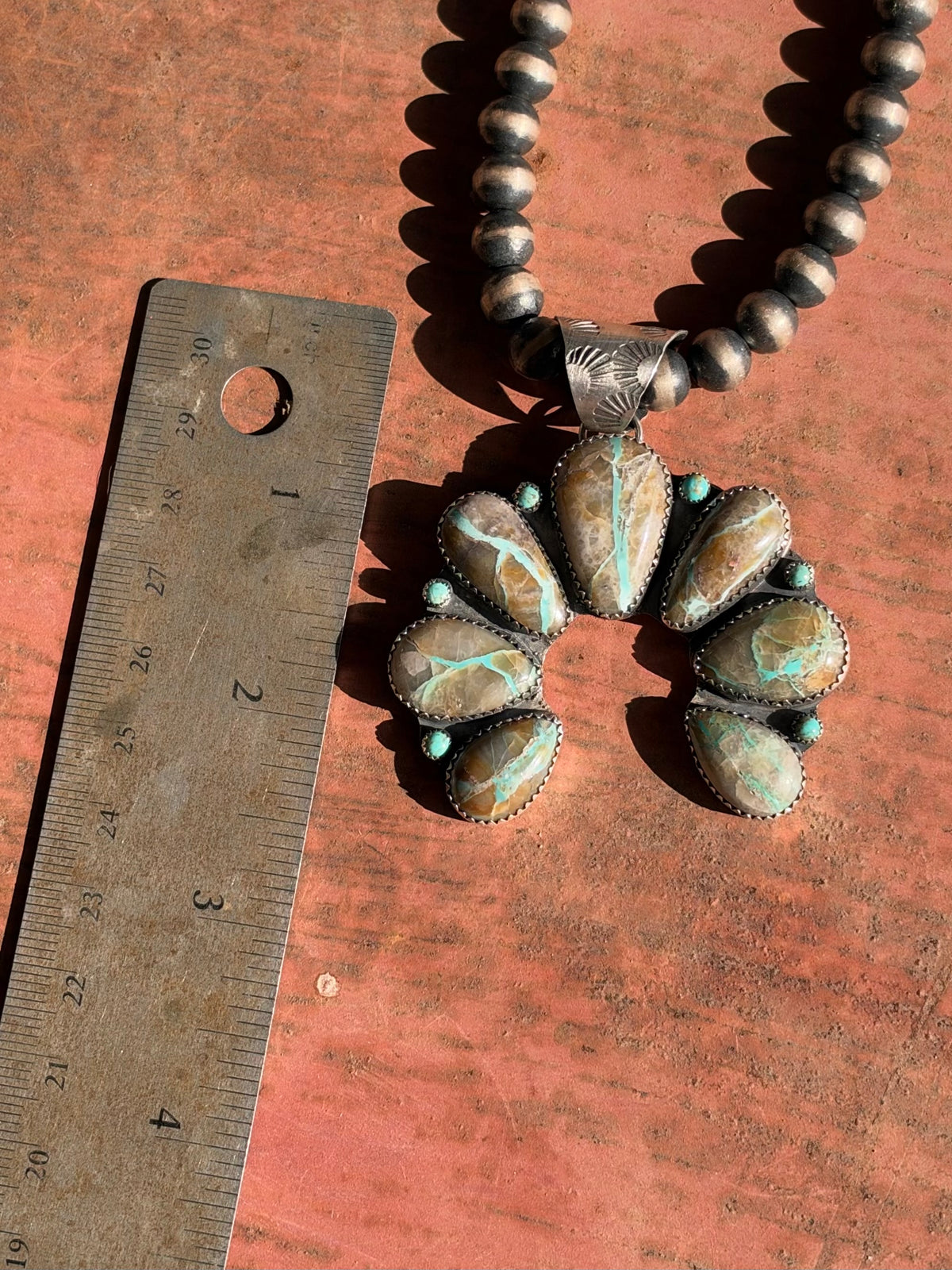 Ribbon Naja Pendant